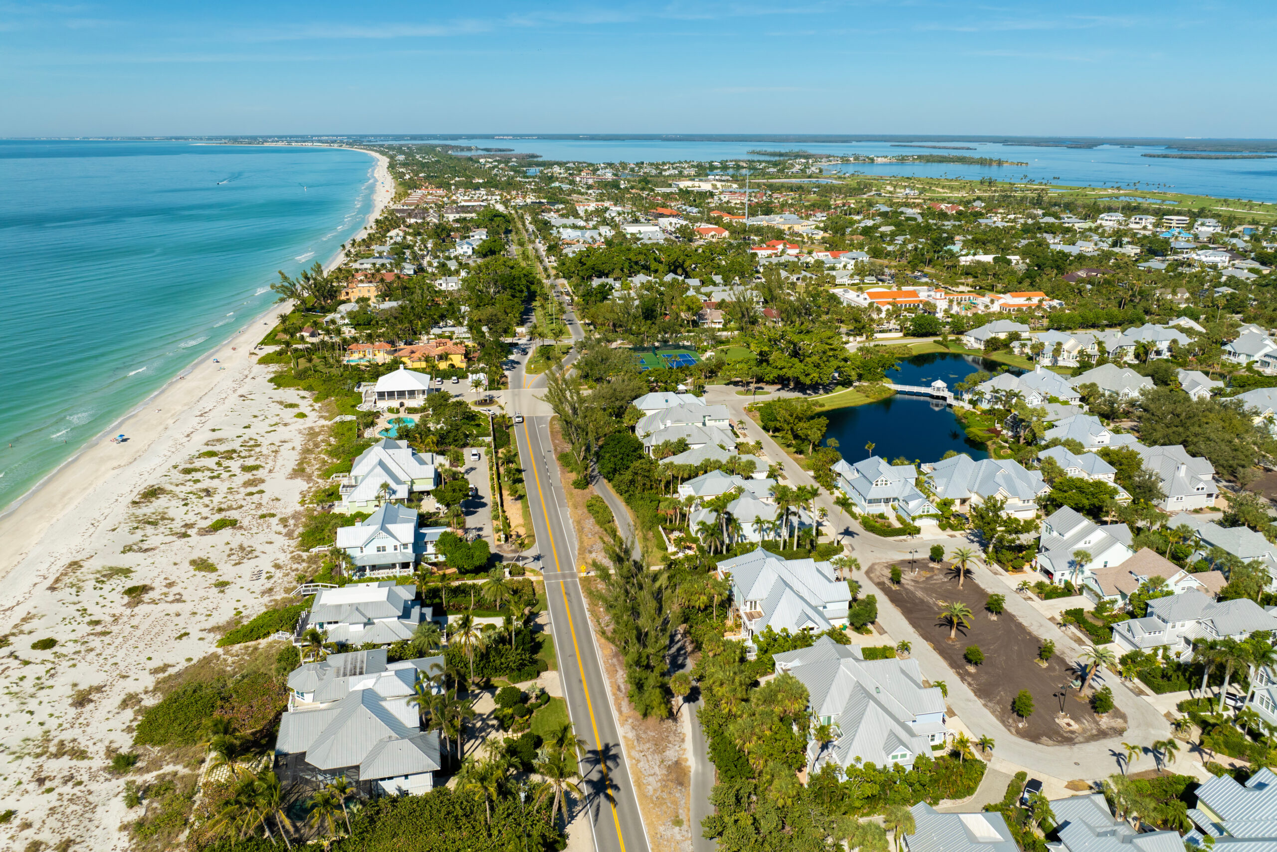 Expensive residential houses in island small town Boca Grande on Gasparilla Island in southwest Florida. American dream homes as example of real estate development in US suburbs